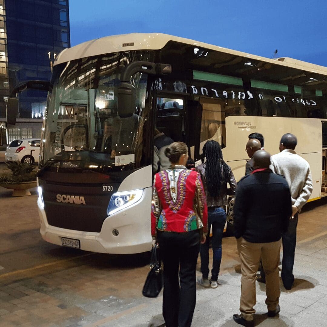 Conference Delegates Boarding a 52 Seater Luxury Coach