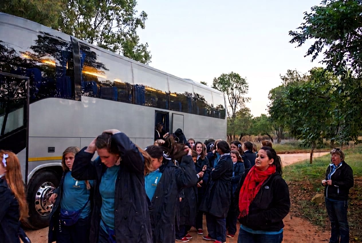 Tour Group preparing to depart on a Kruger Park Tour on a 52 seater luxury coach
