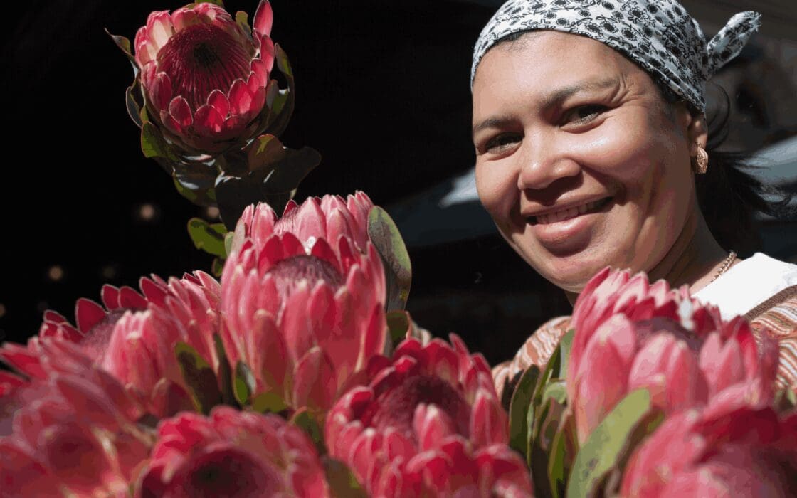 Friendly protea flower seller in South Africa