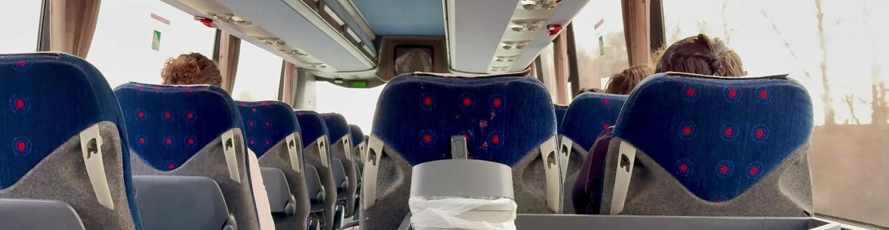 Comfortable coach reclining seating on tour.